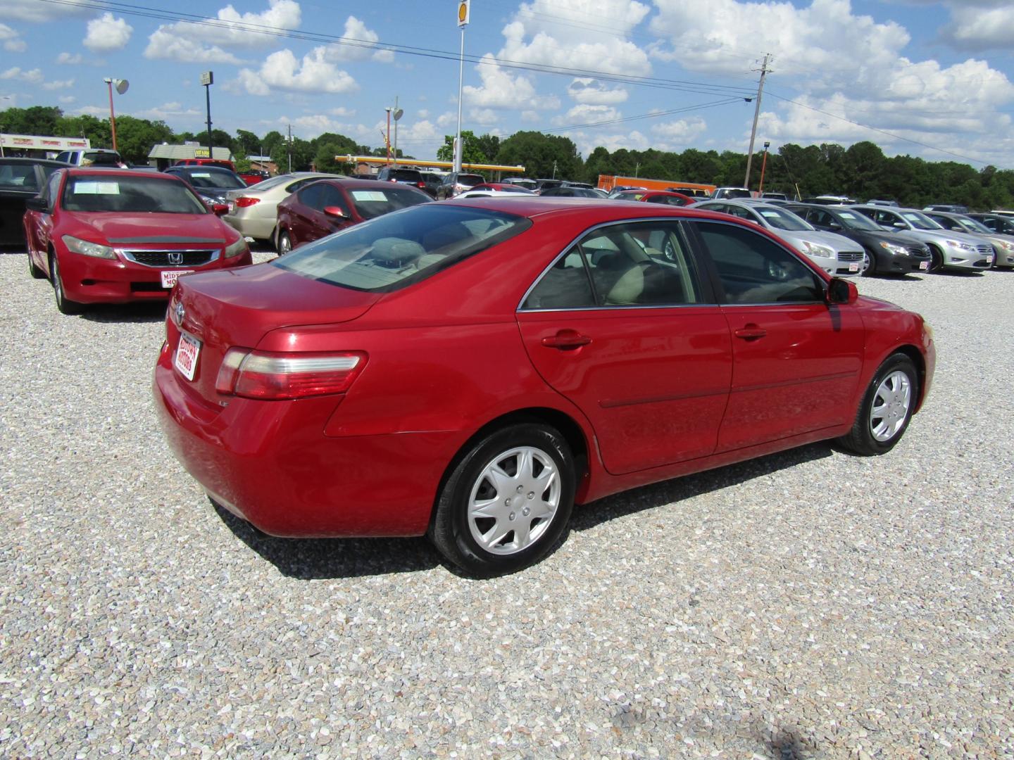 2007 Red /Tan Toyota Camry (4T1BK46K97U) with an 4 CYL engine, Automatic transmission, located at 15016 S Hwy 231, Midland City, AL, 36350, (334) 983-3001, 31.306210, -85.495277 - Photo#7